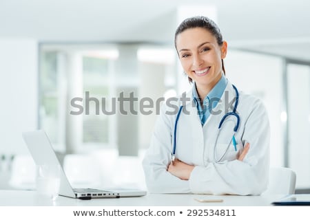 Stock photo: Smiling Confident Female Doctor Healthcare Professional