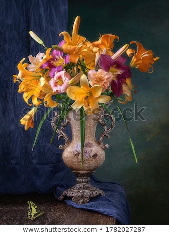 Zdjęcia stock: Beautiful Orange Lily Flowers In Vase Isolated On White