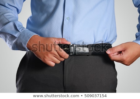 Foto stock: A Man Tightening His Belt