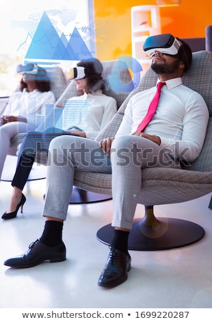 Stock foto: Serious Man Wearing Virtual Reality Device