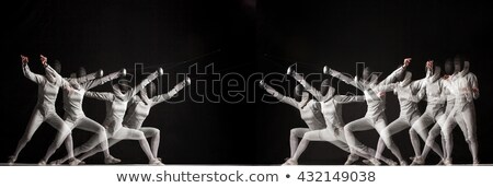 Foto stock: Duel Fencers On A Black Background Collage Of Photos Taken With Stroboscope