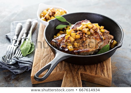Stock photo: Roasted Pork Steak With Caramelized Apples