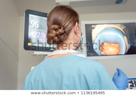 Internist Doctors During Stomach Examination Foto d'archivio © Kzenon