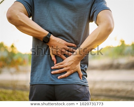 Stok fotoğraf: Close Up Of A Woman Having Back Pain