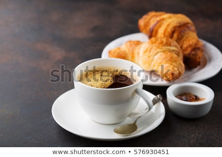 Foto d'archivio: Breakfast With Coffee And Croissants