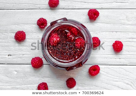 Stockfoto: Fresh Raspberries And Jam On Wooden Table