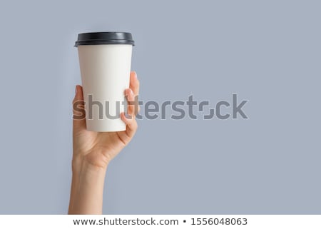 Foto stock: Female Hand Holding Coffee Cup