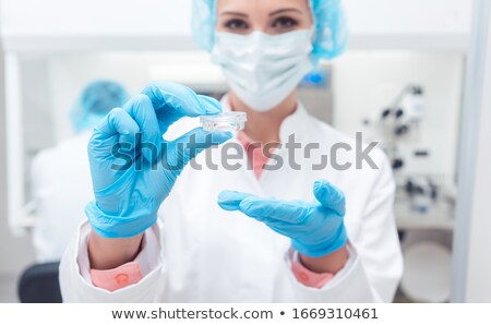 ストックフォト: Scientist In Biolab Showing Vaccine For A Disease