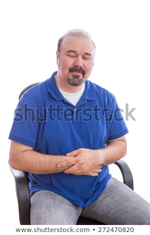 Foto d'archivio: Thoughtful Adult Man On A Chair With Eyes Closed