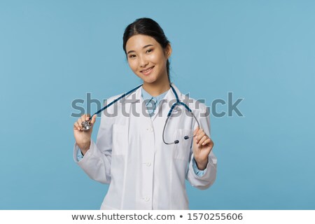 Stock photo: Young Asian Happy Doctor In Medical Gown