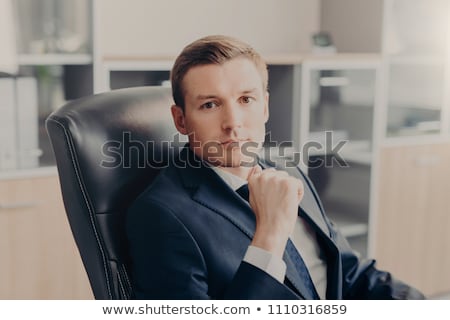 Zdjęcia stock: Intelligent Businessman Resting Head On Chin