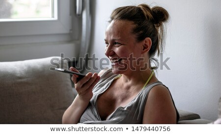 Stock fotó: Site View Of A Beautiful Pregnant Woman Talking On A Phone Isol