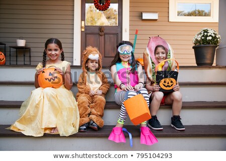 [[stock_photo]]: Sibling Brothers Sitting On The Front Porch