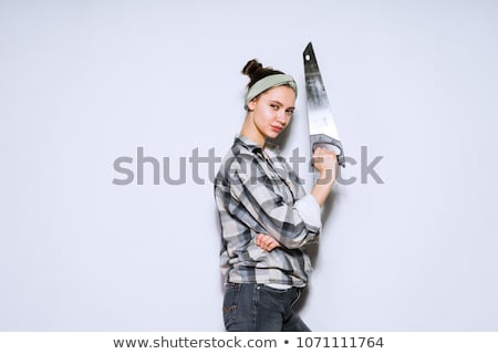 Stock photo: Girl Holding Saw