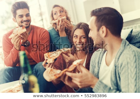 Stockfoto: Friends Eating Pizza At Home