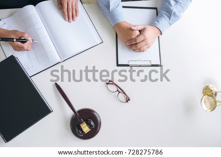 Stock photo: Close Up Of Gavel Male Lawyer Or Judge Consult With Client And