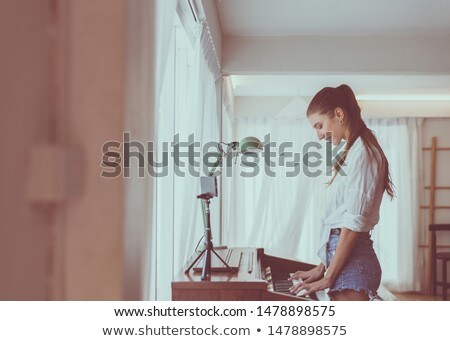 Stok fotoğraf: Young Woman With Music Player