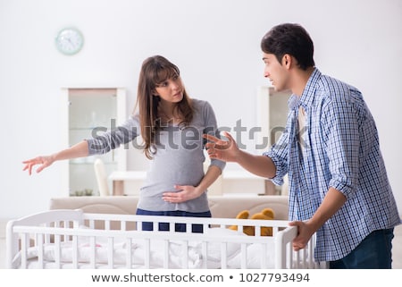 Stock photo: Young Parents Expecting Their First Baby