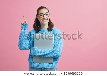 Foto stock: Teenage Girl With Her Finger Up