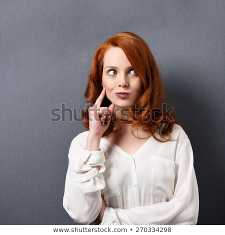 Zdjęcia stock: Pensive Young Woman Looking To Her Right Up