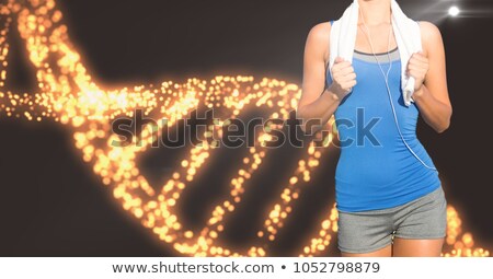 Stock photo: Midsection Of Fit Woman With Orange