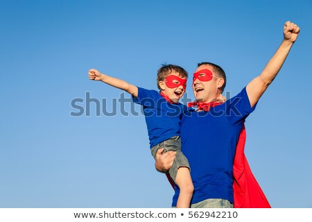 ストックフォト: Father And Children Playing Superhero At The Day Time