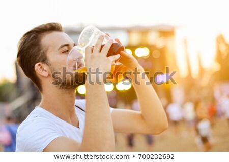 Stock foto: Drinking Beer At Oktoberfest