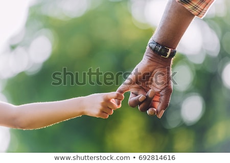 [[stock_photo]]: Rand-père · tient · sa · petite-fille · sur · les · mains