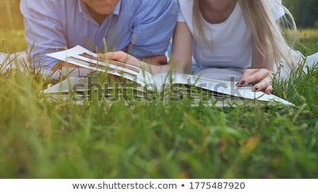 Foto stock: Couple Family Looking Photo Album