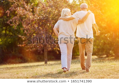 Stockfoto: Portrait Of A Senior Man Outdoors Walking In A Park