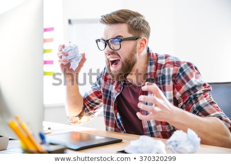 [[stock_photo]]: Angry Young Man And Tablet Pc