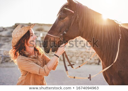 ストックフォト: Cowgirl In The Farm