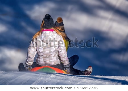 [[stock_photo]]: Happy Kids Sliding On Sleds Down Hill In Winter