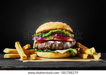 Stockfoto: Craft Beef Burger On Wooden Table Isolated On Black Background