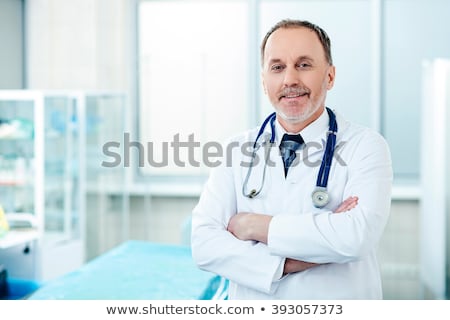 [[stock_photo]]: The The Old Male Doctor Working In The Clinic