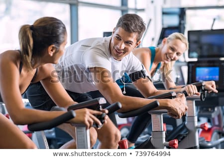 Stock fotó: Beautiful Young People Talking In A Gym While Working Out