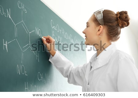 Stock photo: Girl Studying Chemistry At School Laboratory