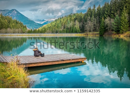 Stockfoto: Beautiful Girl On Background Blue Sky