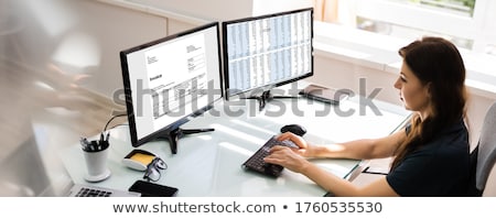 Сток-фото: Female Finance Advisor Using Electronic Invoice Software