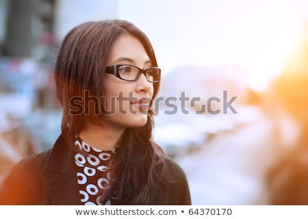 Imagine de stoc: Portrait Of A Beautiful Young Businesswoman Outside