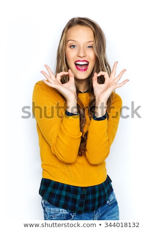 Stok fotoğraf: Lovely Teenage Girl Showing Ok Sign