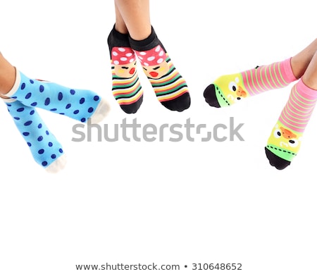 Stock foto: Legs Long Female In Striped Socks Isolated On White Background