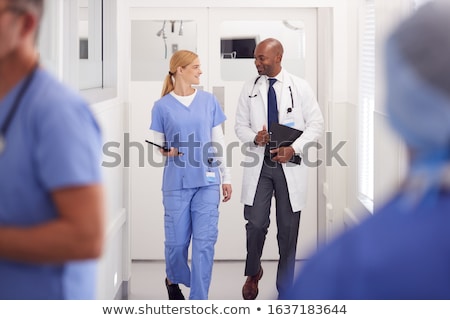 Stock fotó: Doctor And Two Nurses