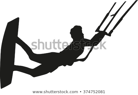 ストックフォト: Silhouette Of A Kitesurfer Flying