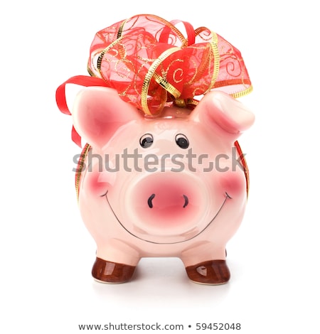 Stok fotoğraf: Christmas Deposit Concept Piggy Bank With Festive Bow Isolated