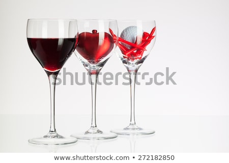 Сток-фото: Wine Glasses With Red Wine Heart And Golf Ball