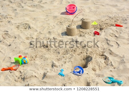 Stockfoto: Childrens Colorful Sandy Toys On Beautiful A Beach India Goa