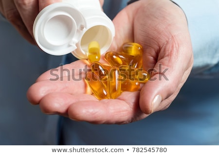 Stok fotoğraf: Omega 3 Pill In The Palm