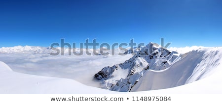 Foto stock: Top View To Caucasian Mountains Peaks Covered By Snow