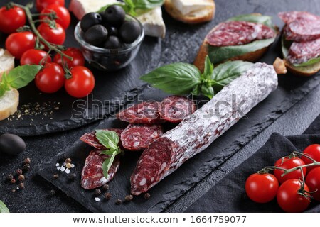 Foto stock: Stacked Dried Sausages